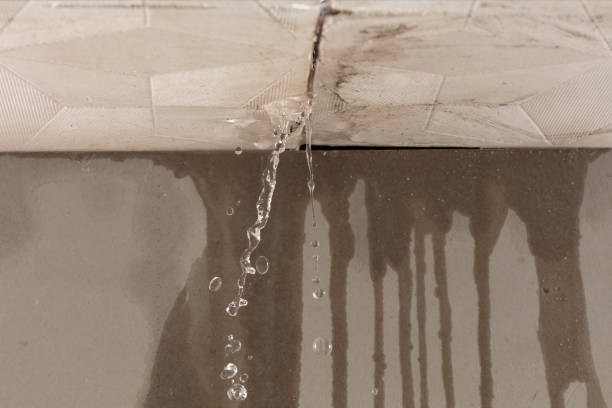 Professional Flood Damage Cleanup technician working in East Chatham, NY